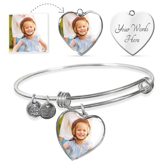 hart shaped photo charmed on silver bangle with personal message on back